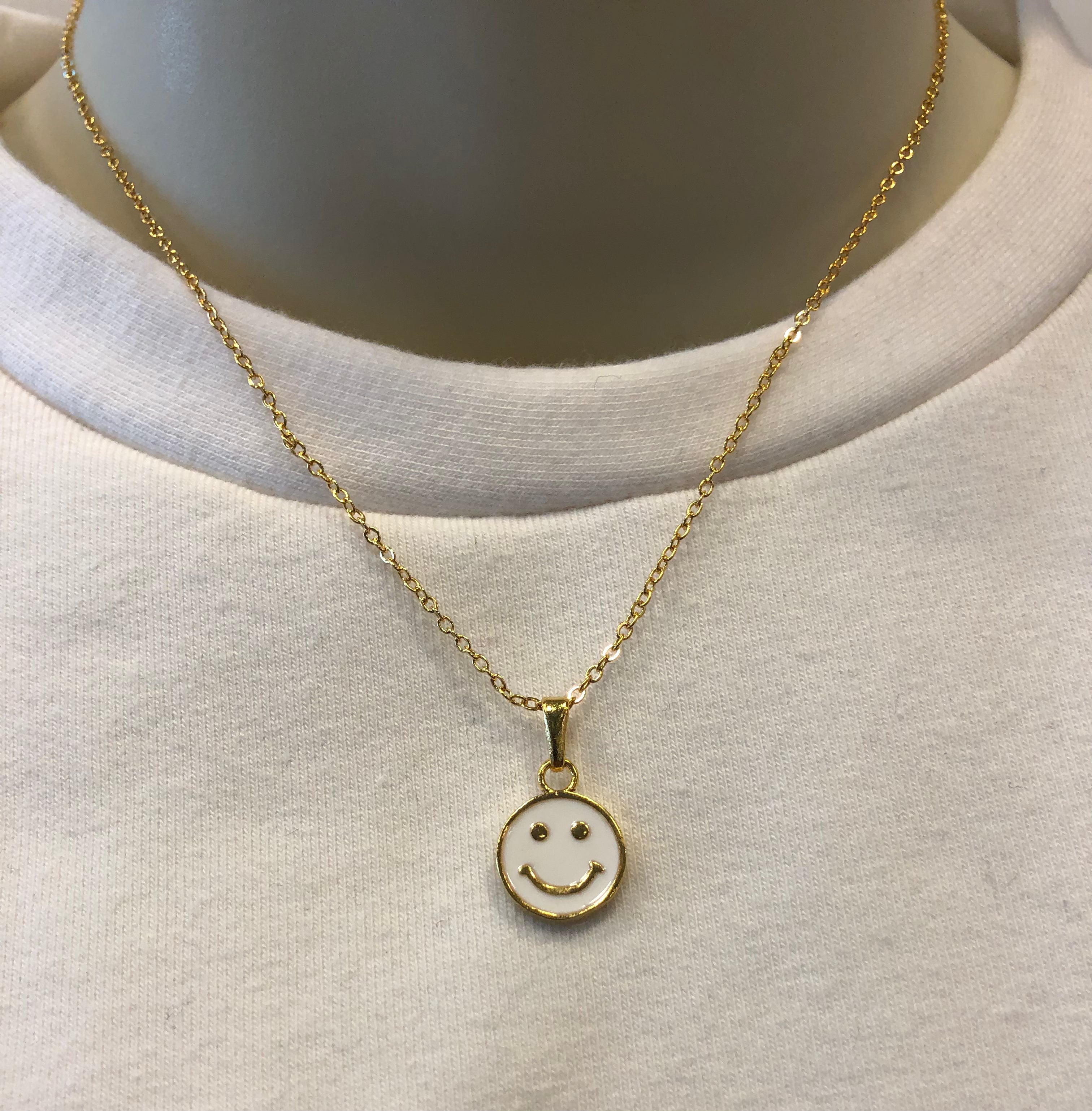 Gold smiley face pendant discount