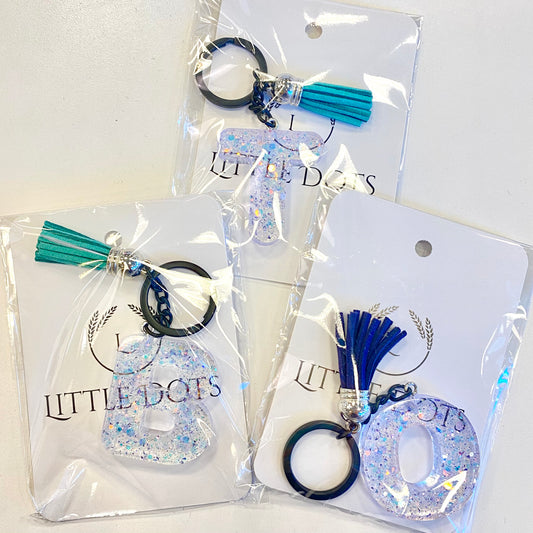 Initial Keychains in Clear with Blue Sparkle