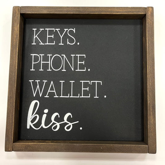 Keys, Phone, Wallet and Kiss Sign